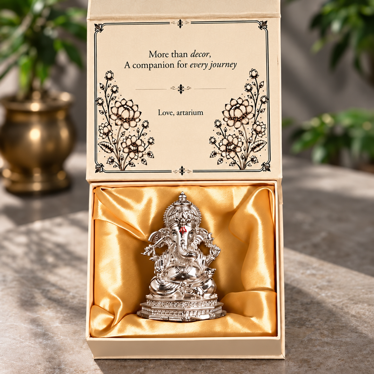 Divine Ganesha silver-plated idol with premium packaging 